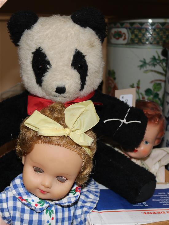 A collection of various Rosebud, Pedigree, Tudor Rose and other dolls, vintage dolls hospital items and two toy pandas